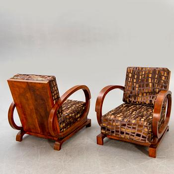 A pair of Art Deco easy chairs.