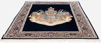 A semi-antique pictoral 'Lion and Sun' Kerman rug, c. 205 x 144 cm.