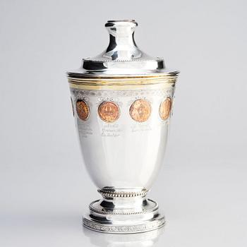 A Swedish Gustavian silver parcel-gilt beaker with cover and copper coins, mark of F Petersson Ström, Stockholm 1789.