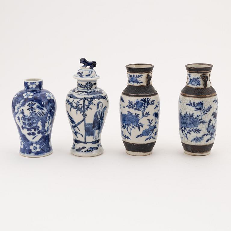 A group of four blue and white Chinese miniature urns, 19th and 20th century.