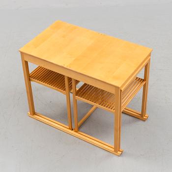 A Swedish Carl Malmsten "The Sled" birch side table nesting table i three parts, Åfors Möbelfabrik.
