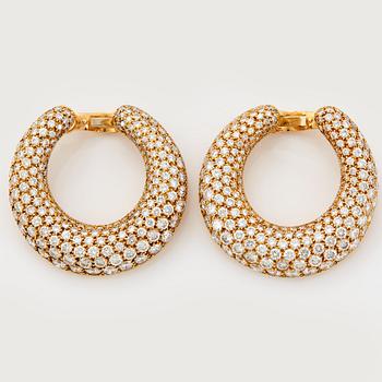 897. Cartier a pair of hoop earrings.