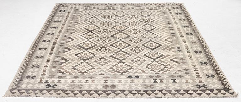 A Kelim carpet, a. 295 x 200 cm.