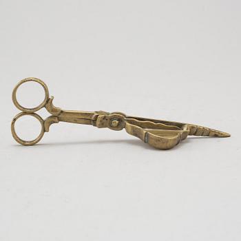 A 17th/18th century bronze candle scissors.