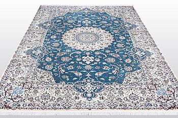 A carpet, Nain, part silk, 6 Laa, ca 312 x 208 cm.