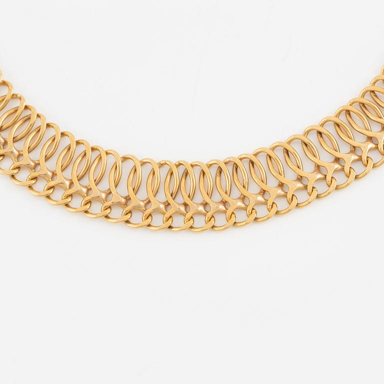 Necklace, 18K gold, circular links.