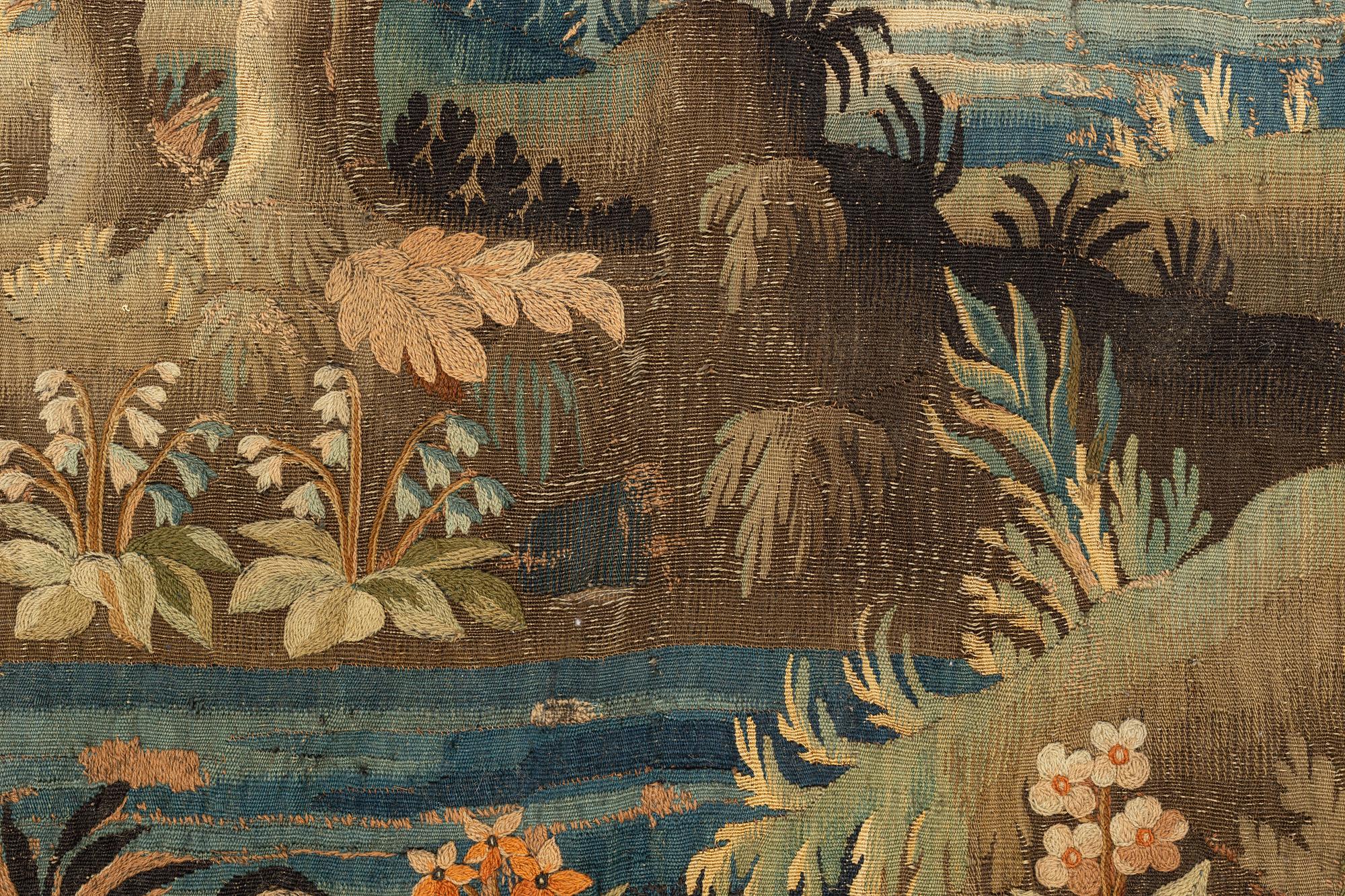 A tapestry, "Verdure", tapestry weave, ca  386 x 289 cm, Flanders, the first half of the 18th century.