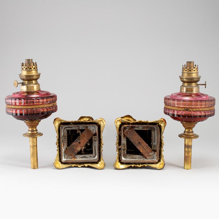 A pair of empire style table oil lamps, bronzed metal and glass, Dublot Freres, Rennes, late 19th century.