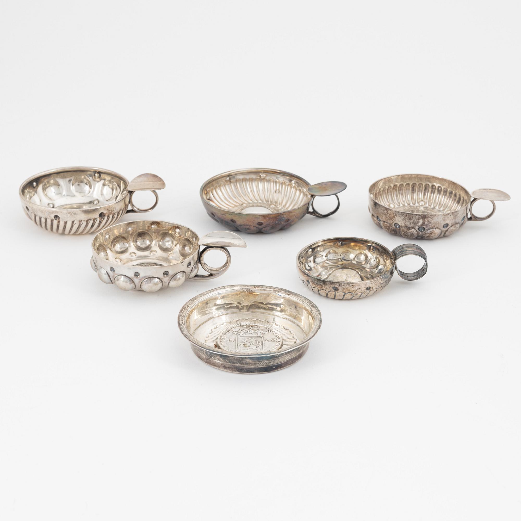 Six silver tastevin/wine tasting cups, including Gustave Keller, Paris, France, 19th/20th century.
