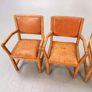A set of four 1970:s Tage Poulsen Daumiller oak and leather armchairs for GM Möbler Denmark.