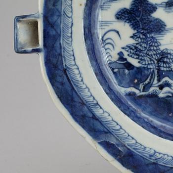 A set of three blue and white plates and a hot water dish, Qing dynasty, 18th/19th Century.