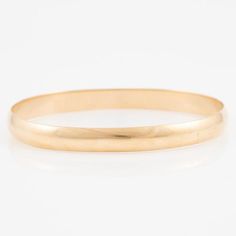 Bangle 18K gold.