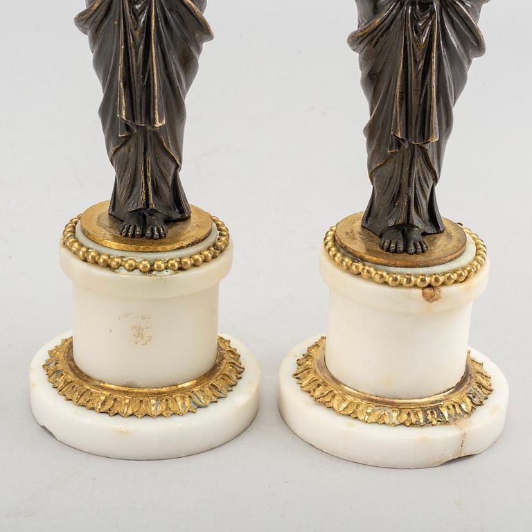 A pair of Louis XVI 18/19 century candlesticks.