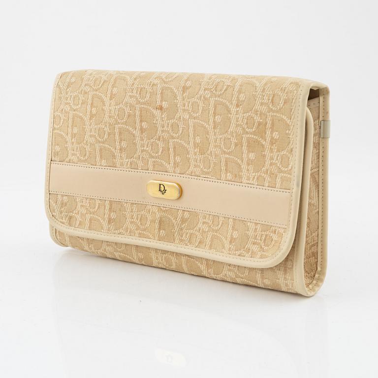 Christian Dior, a monogram clutch.