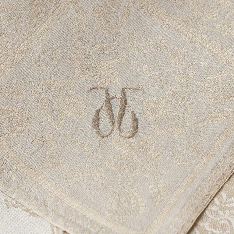 A tablecloth and napkins, 12 pcs., linen damask, signed Handvävd C.S.