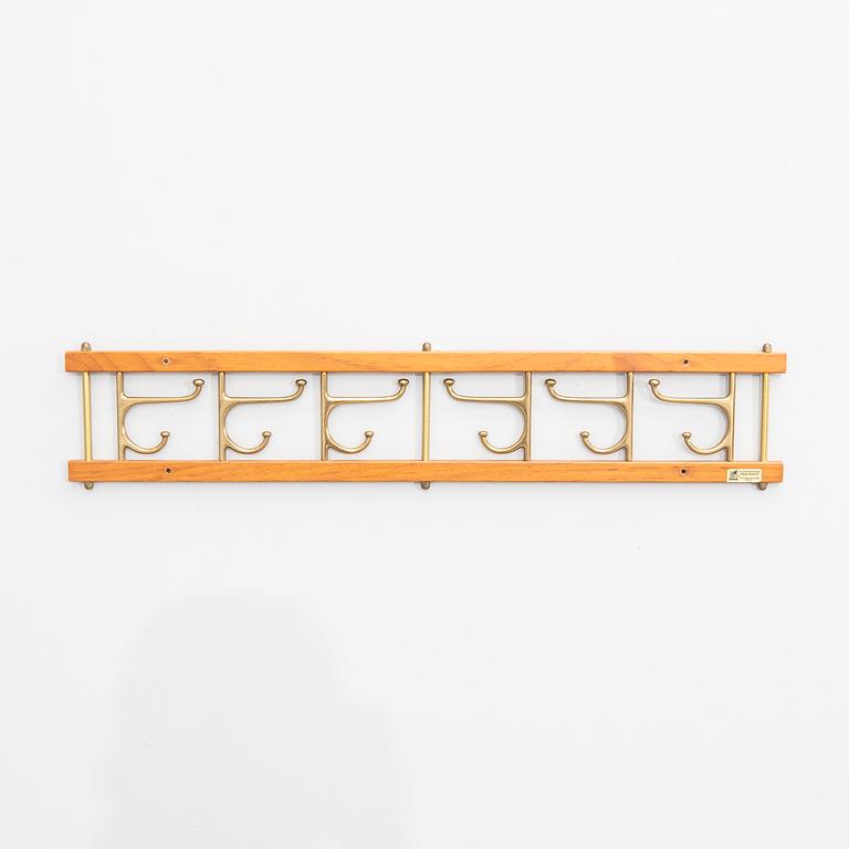 Klädhängare, "Dekorativ", Skoglunds metallgjuteri, Anderstorp, 1950/60-tal.