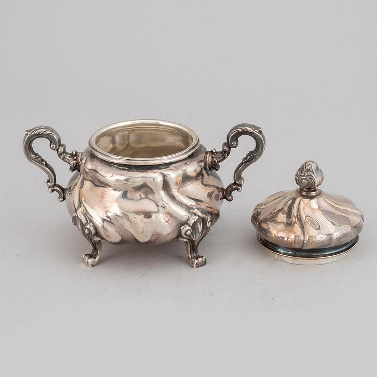 A silver coffee pot, creamer, sugar bowl and tray, swedish import mark.