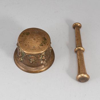 A 17th century bronze mortar.