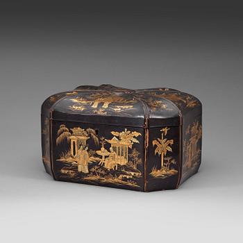363. A black and gold laquer tea box, Qing dynasty 19th century.