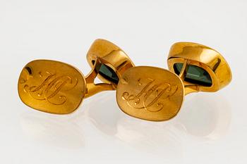 Manschettknappar 18K guld med grön quartz ca 15 x 10 mm, total vikt 10,3 g.