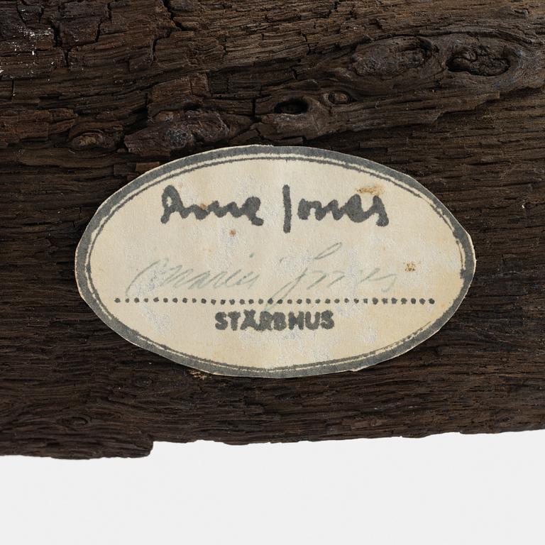 Arne Jones, sculpture, brass on driftwood, signed on label by the estate.
