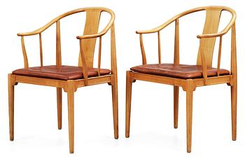 67. A pair of Hans J Wegner cherrywood 'China' armchairs, Fritz Hansen, Denmark 1966-67.