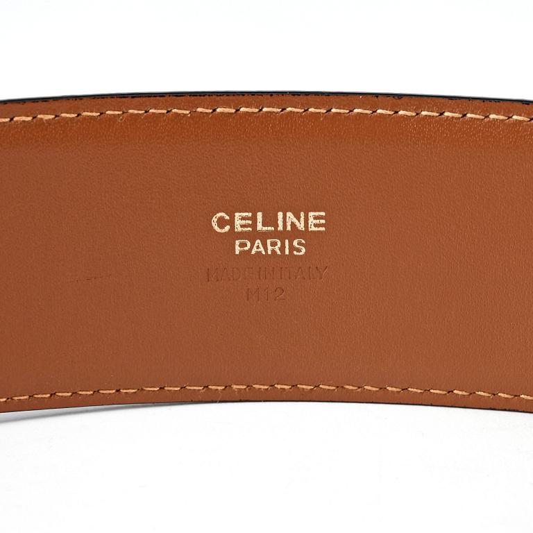 CÉLINE, a black leather belt.