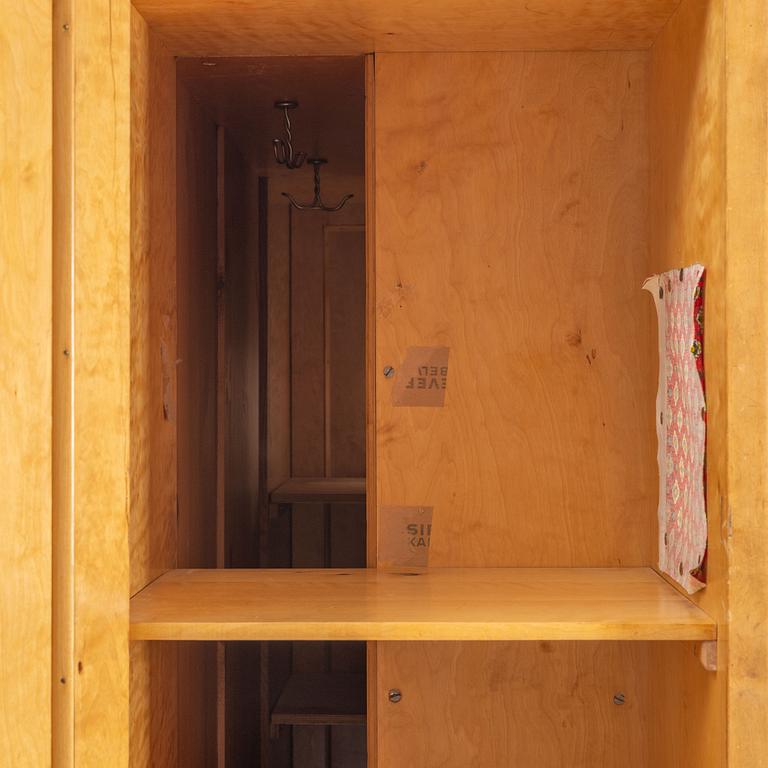 A birch veneered book case/wardrobe, 1930's/40's.