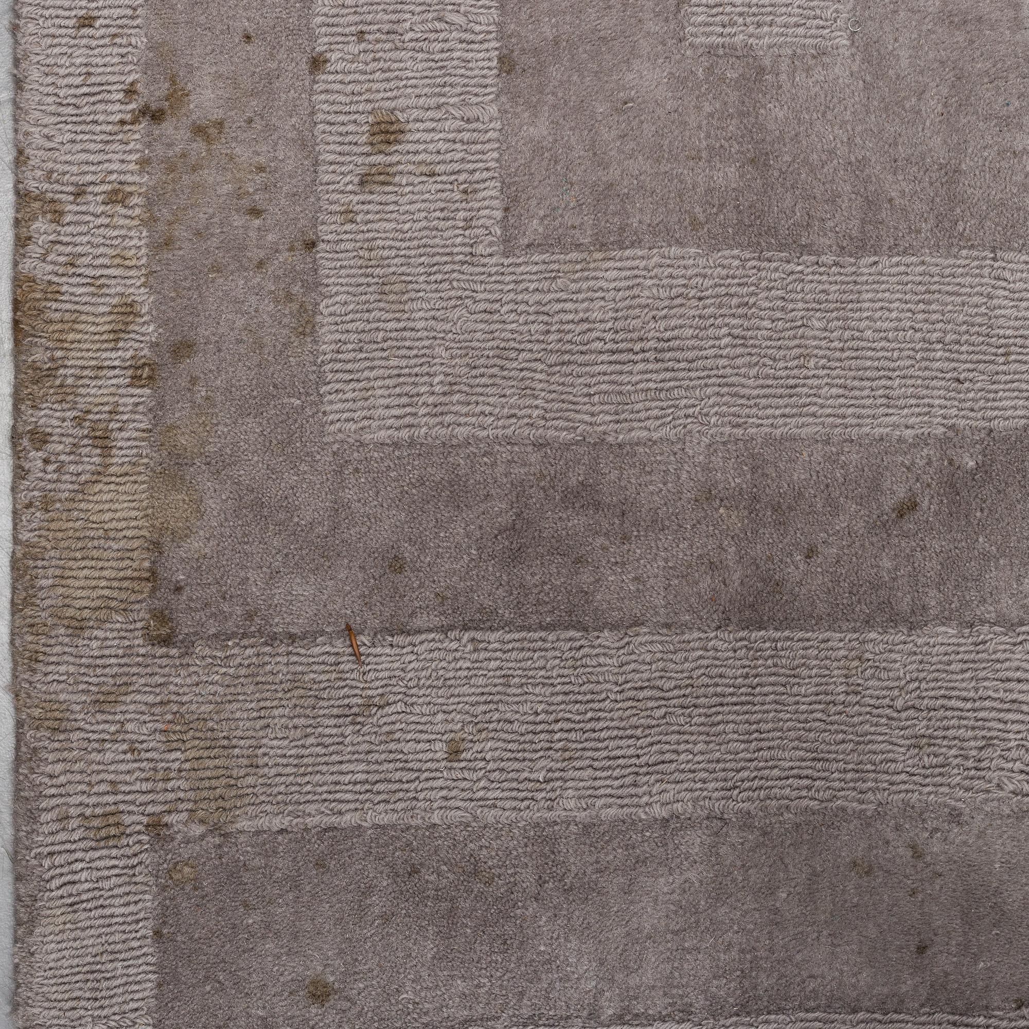 A Layered "Wool Cubes" carpet, 390x620 cm.