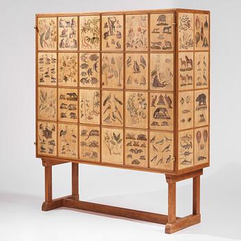 Josef Frank, a rare cabinet covered with prints depicting different animals and plants, Firma Svenskt Tenn, Sweden 1940s.