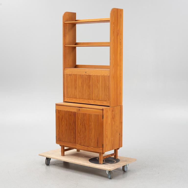 Göran Malmvall, a pinewood book case with secretaire and cabinet, second part of the 20th Century.