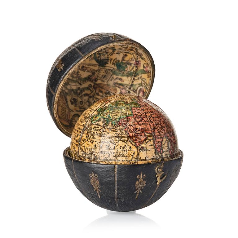 A German 2 ½-inch pocket globe with case by Johann Baptist Homann, Nuremberg, circa 1710.