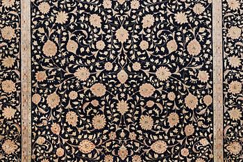 A carpet, Mashad, c. 548 x 383 cm.