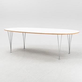 A Super ellpitical dining table, by Bruno Mathsson and Piet Hein for Fritz Hansen dated 2008.