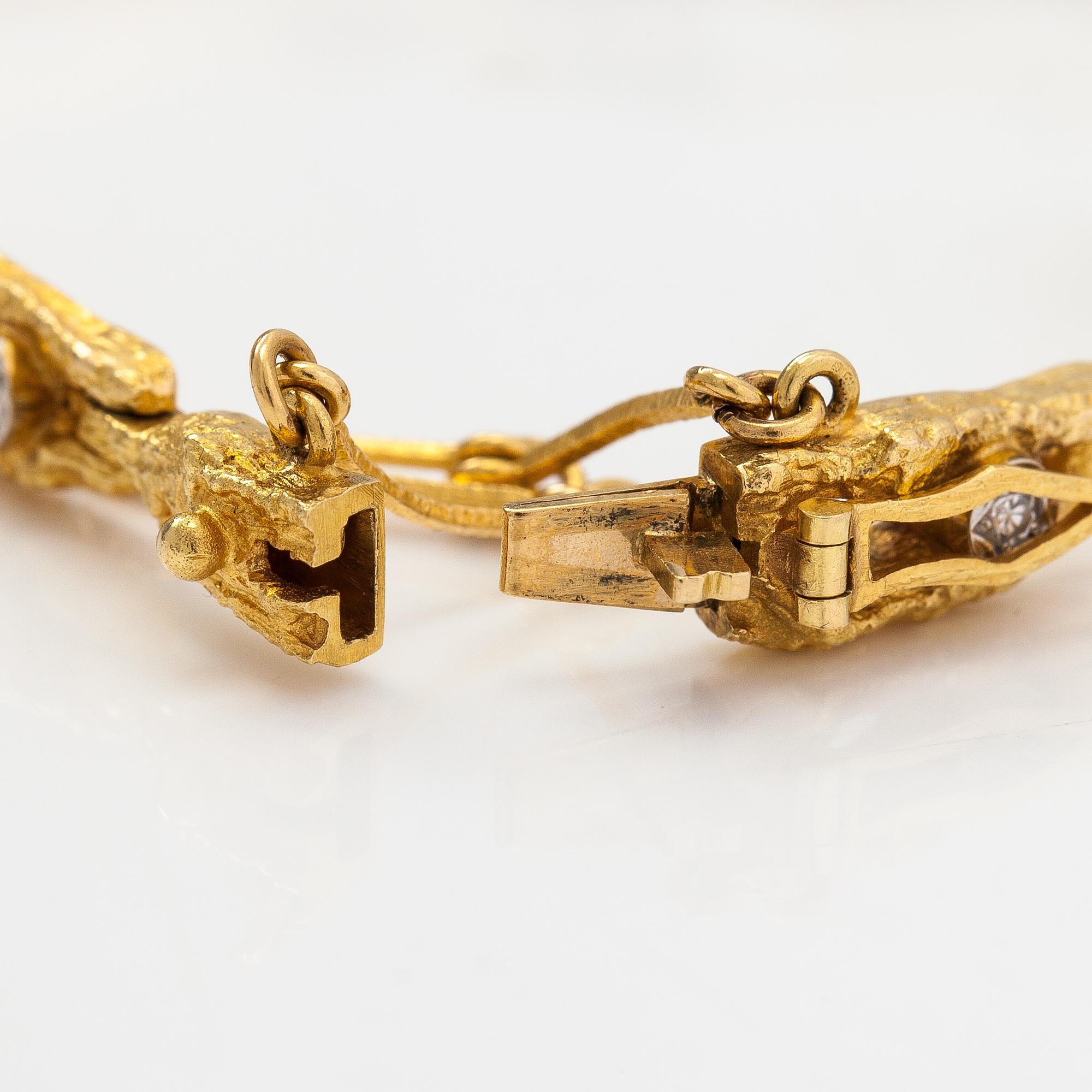 Björn Weckström, Rannekoru "Timanttilampi", 18K kultaa ja timantteja n. 0.16 ct yht. Lapponia 1974.