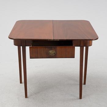 A mahognay card table, early 19th Century.