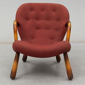 A mid 20th cenutry "Clam Chair" / "Muslinge", attributed to Philip Arctander.