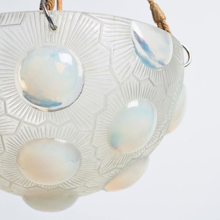 René Lalique, a 'Soleil' moulded opalescent glass ceiling light, France 1920-30s.