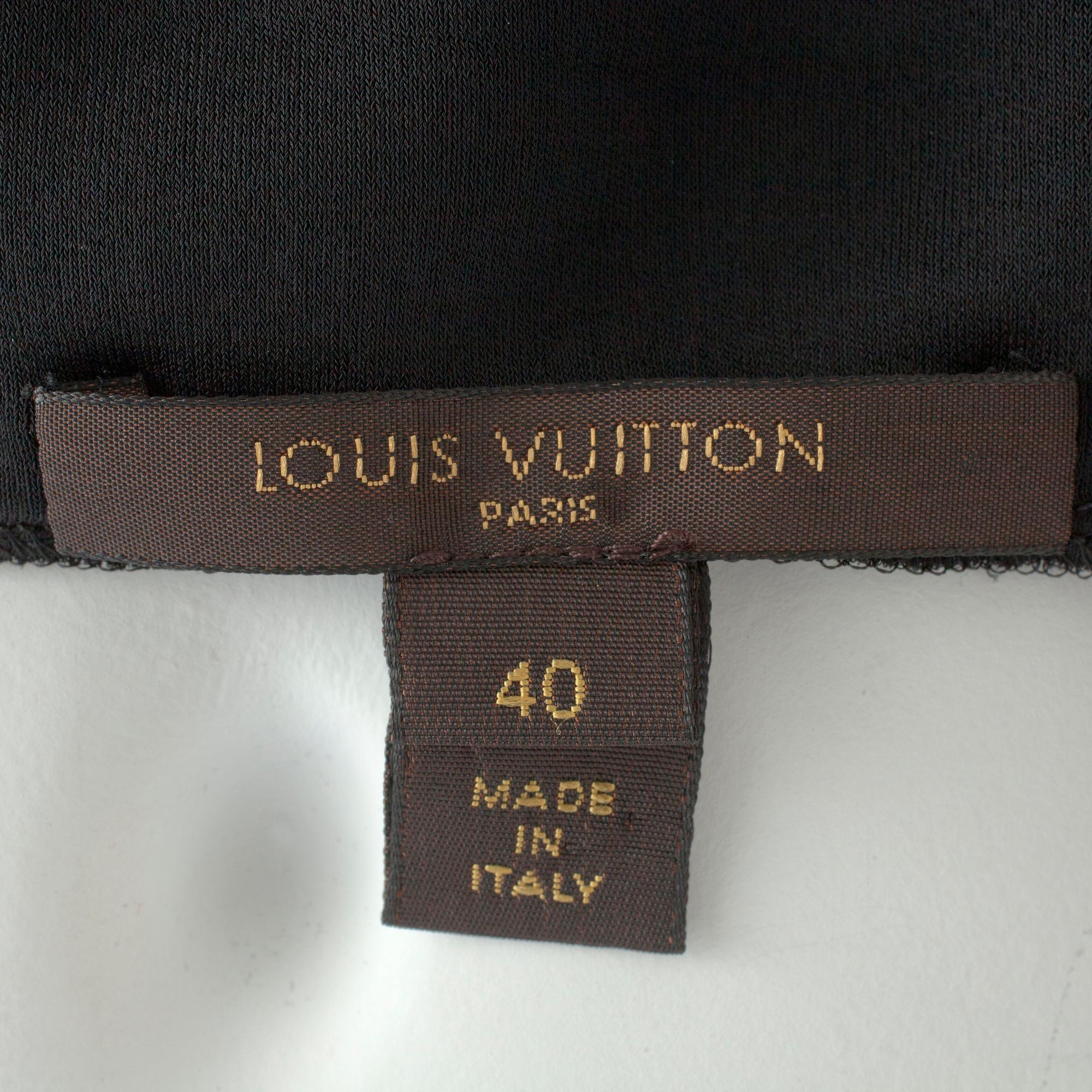 LOUIS VUITTON, a black silk mix dress.