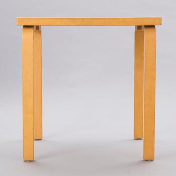 A mid-20th Century table, Artek.