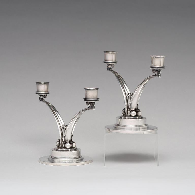 Harald Nielsen, a pair of sterling silver candelabra, Georg Jensen, Copenhagen 1933-44, model nr 278.