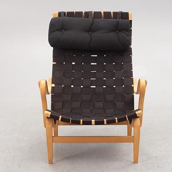 Bruno Mathsson, a "Pernilla" armchairs with ottoman, Dux, Sweden, second half of the 20th century.
