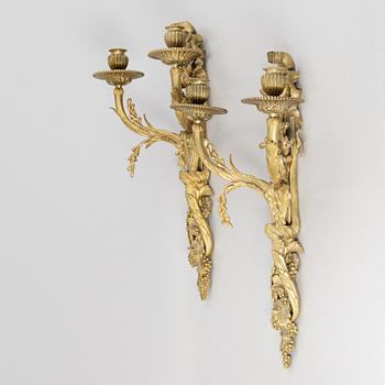 A pair of wall lights, Louis XVI style, early 20th century.