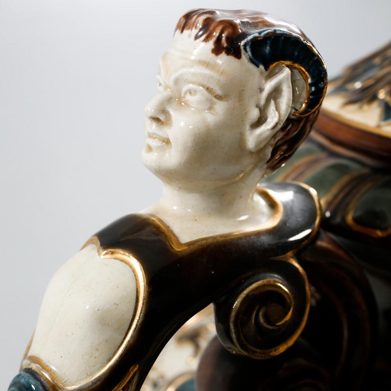A majolica urn with pedestal from Rörstrand, around the year 1900.