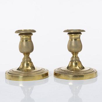 A pair of candle sticks, Empire, France, first half of the 19th century.