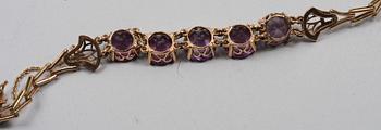 HALSBAND OCH ARMBAND. Gulddoublé och stenar.