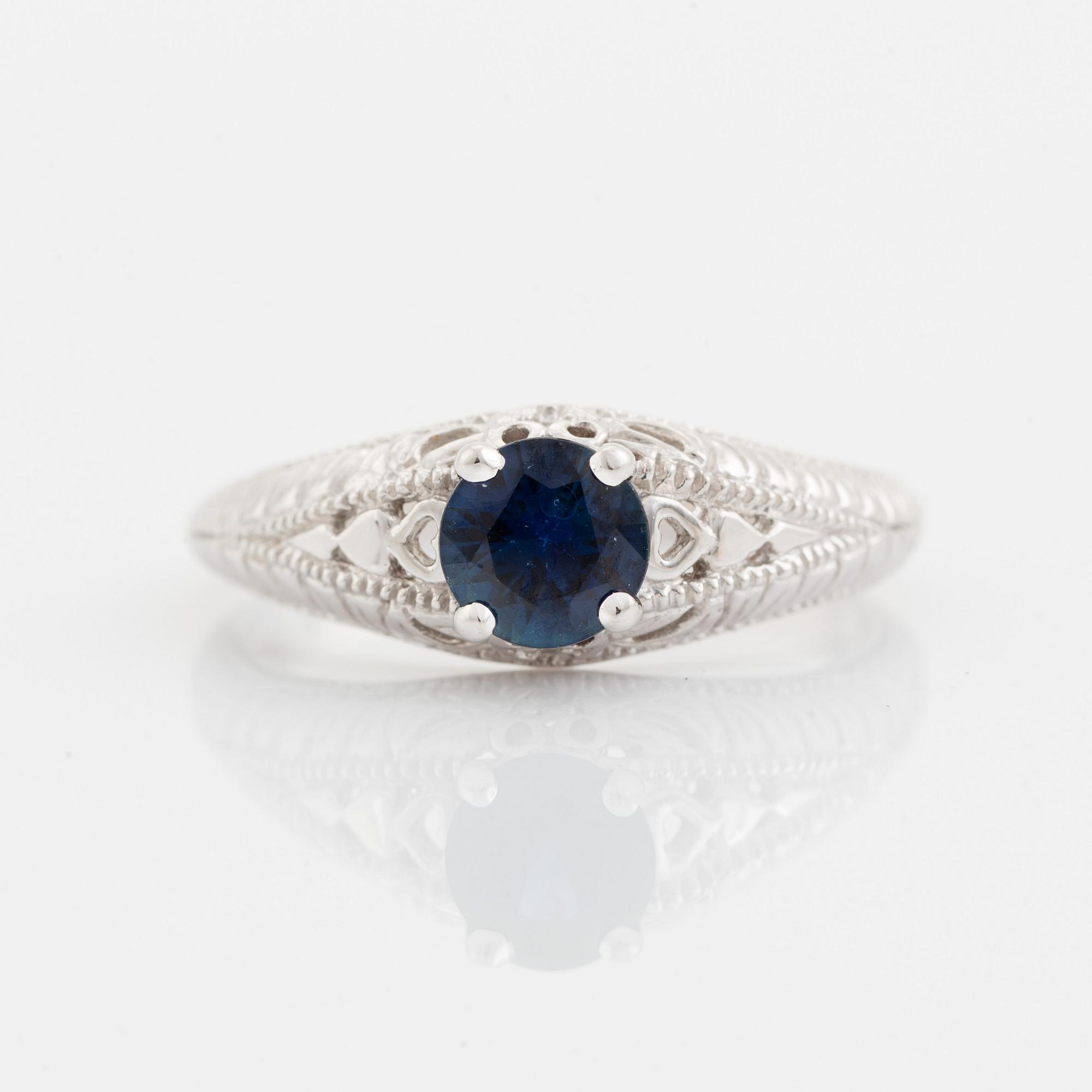 White gold and sapphire ring.