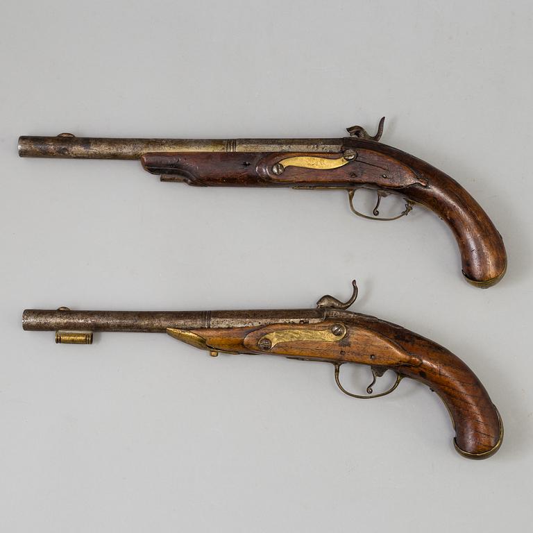 Two percussion lock pistols from around year 1800. Changed from flint lock to percussion lock.