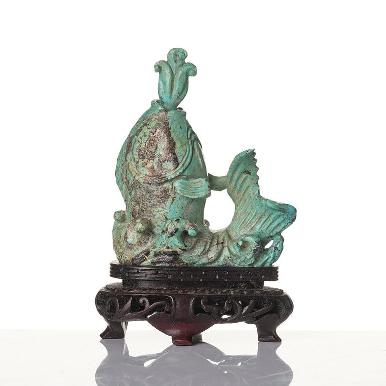 A well sculptured turquoise figure of a carp, Qing dynasty, 19th century.