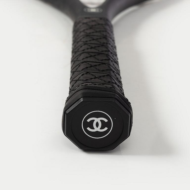 Chanel, tennis racket and 4 balls with case.